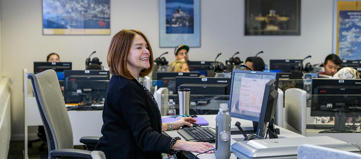 Instructor and students in the language lab